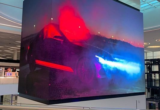 Hanging LED cube screen in a mall